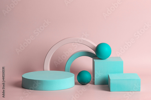 Abstract composition with geometric shapes forms. Exhibition podium  platform for product presentation on pastel pink background