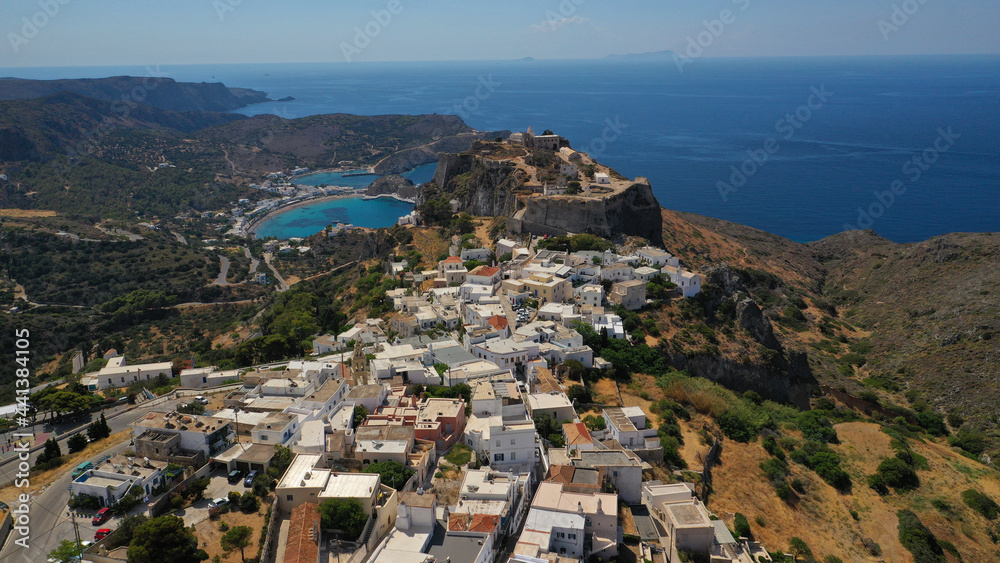 Aerial drone photo of picturesque main village in island of Kythira built uphill next to iconic castle overlooking Kapsali bay