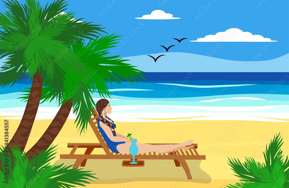 A woman lies on a sun lounger on a sandy beach near the ocean, drinks a cocktail and relaxes. Vacation at sea concept.