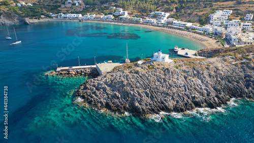 Aerial drone photo of beautiful twin bay, beach and small village of Kapsali  below iconic castle of Kythera island, Ionian, Greece photo