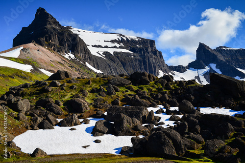 The boulders, peaks and crystal clear rivers and lakes of magical Stórurð valley, East Fjords, Iceland photo