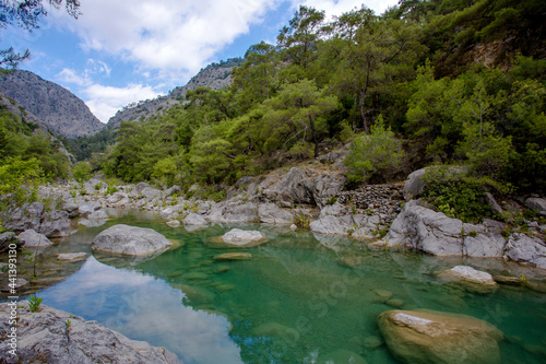 Travel through the Goyniuk Canyon. Beautiful places in Turkey. Mountain river and rocks in Kemer.