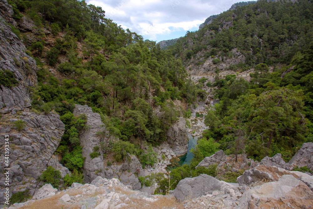 Travel through the Goyniuk Canyon. Beautiful places in Turkey. Mountain river and rocks in Kemer.