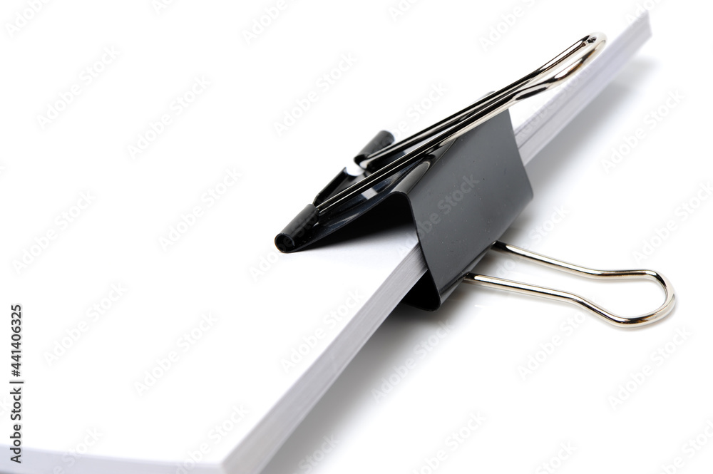 binder clips and paper isolated on white background binder clips and paper isolated on white background