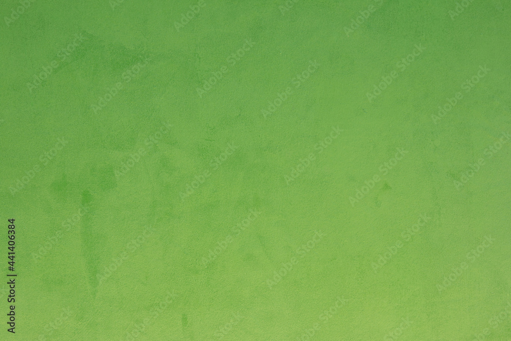 Background with wall texture with green paint.