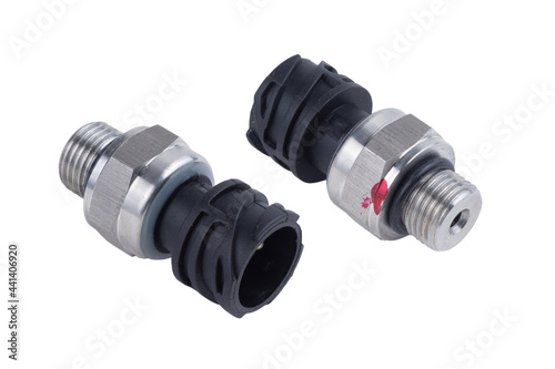 the oil pressure sensor in the truck engine, isolated on a white background.