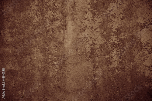 Background with dark textured cement wall texture.