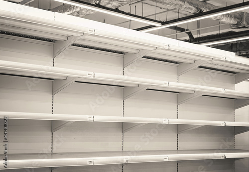 empty new rack shelves in hypermarket