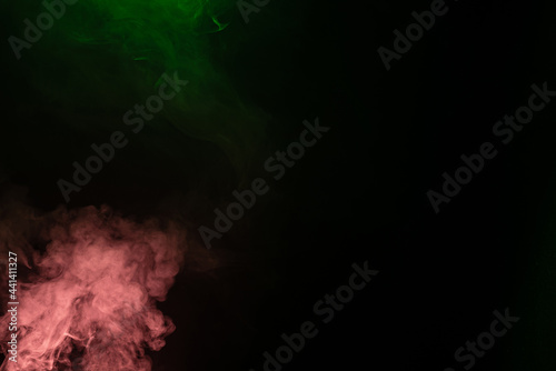 Green and pink steam on a black background.