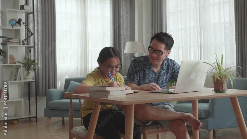 Caring Father Help Daughter To Do Homework. Kid Girl Use Laptop Makes Notes. Homeschooling Conducted By Parent
Caring Father Help Daughter To Do Homework. Kid Girl Use Laptop Makes Notes. Homeschooling Conducted By Parent