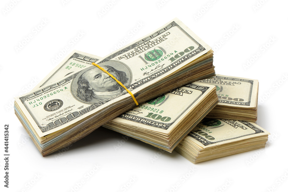 Many bundle of US 100 dollars bank notes isolated on white background Many bundle of US 100 dollars bank notes isolated on white background
