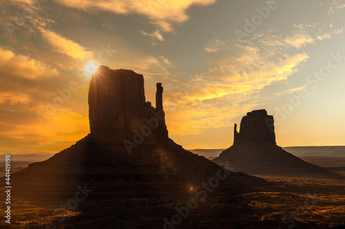 First pink sunrise lights at Monument Valley in the beautiful August sunrise, Utah