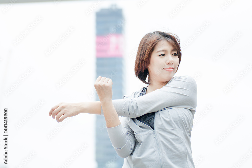 Fitness woman exercising outdoor in urban environment Fitness woman exercising outdoor in urban environment