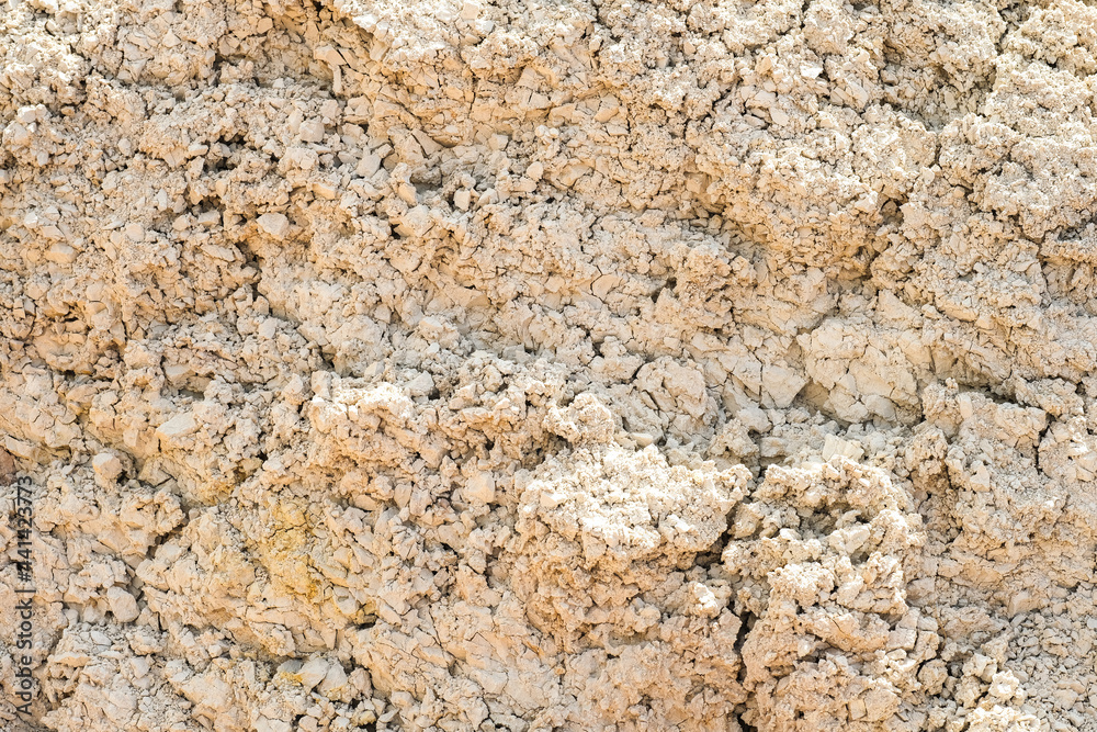 The texture of clay. Dry clay texture background. The texture of clay. Dry clay texture background.