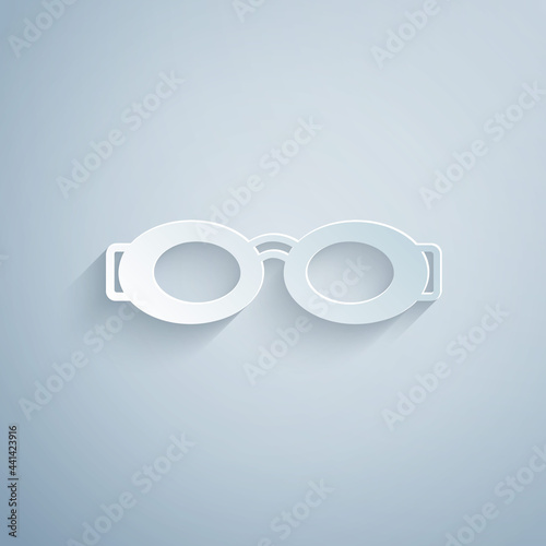 Paper cut Glasses for swimming icon isolated on grey background. Swimming goggles. Diving underwater equipment. Paper art style. Vector