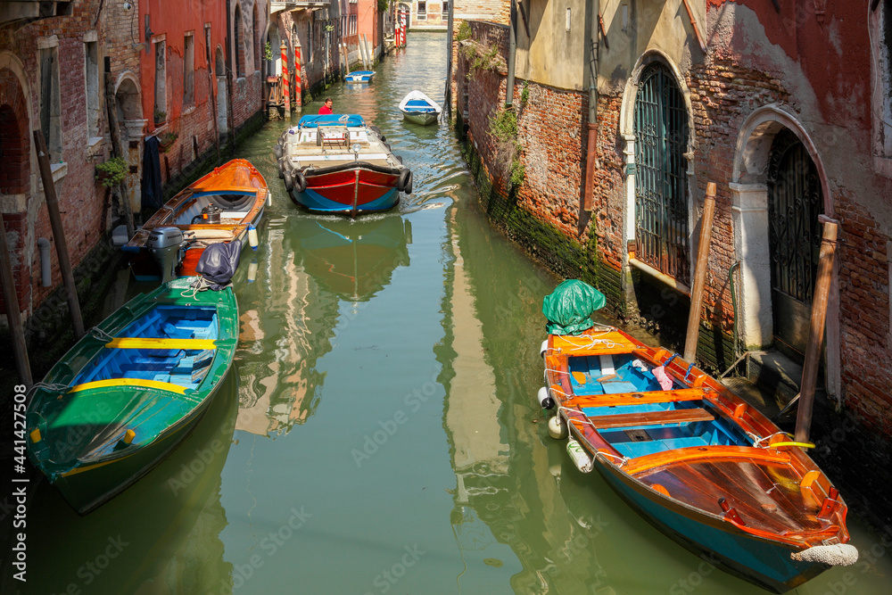 Motor boats on the Rio Malgaga; Dorsoduro; Venice; Veneto; Italia, Europe.