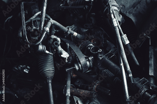 Car motor parts. Auto motor mechanic spare or automotive piece on dark backgr...