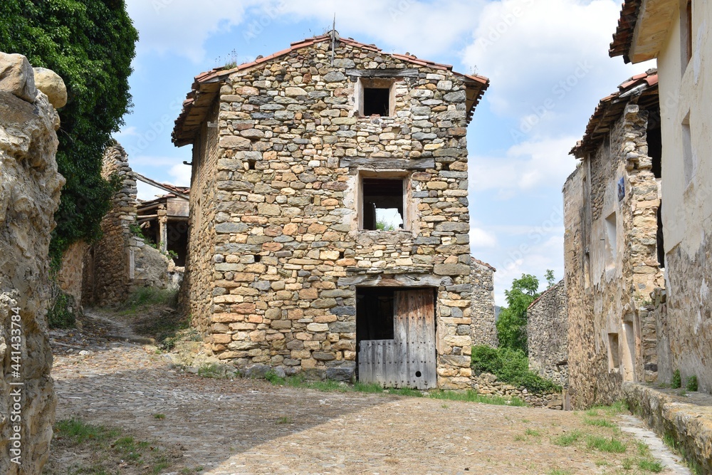 Old house built in dry stone in the town square of Villarijo. Currently abandoned, Soria province, Spain.