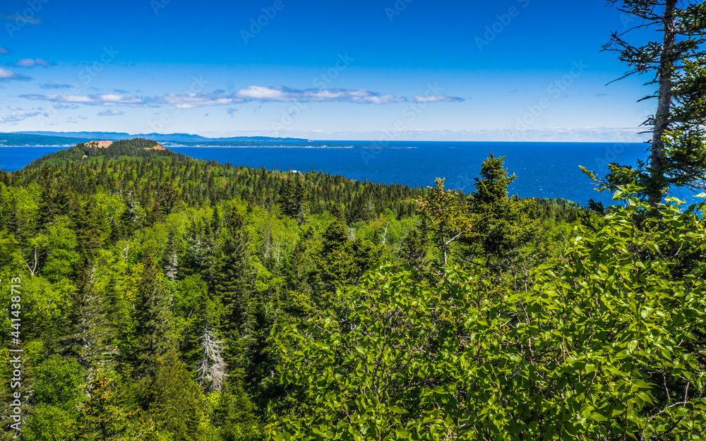View on the Atlantic Ocean from the Petit Mont St Anne, a small moutain located located within the Percé Unesco Geopark in Gaspesie (Quebec, Canada) View on the Atlantic Ocean from the Petit Mont St Anne, a small moutain located located within the Percé Unesco Geopark in Gaspesie (Quebec, Canada)