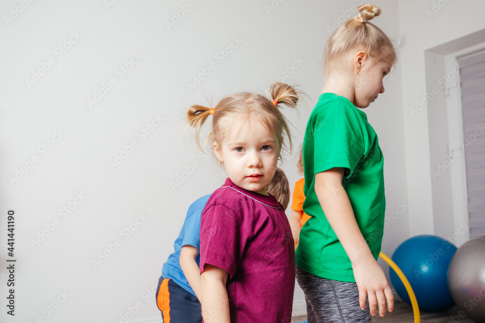 Portrait of cute girl during sport activities at daycare Portrait of cute girl during sport activities at daycare