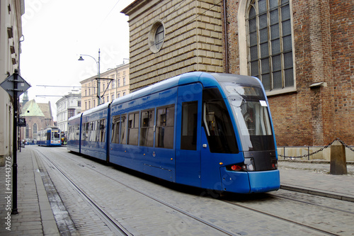 Blue tram in the city