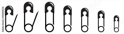 Set of safety pin icons isolated on white background. Safety pin flat vector icons for video apps and websites. Black safety pin vector illustration.