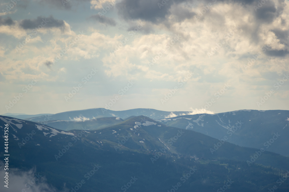 Fog on a mountain range in the Carpathian mountains