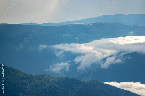 Fog on a mountain range in the Carpathian mountains © onyx124