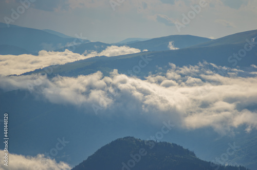 Fog on a mountain range in the Carpathian mountains