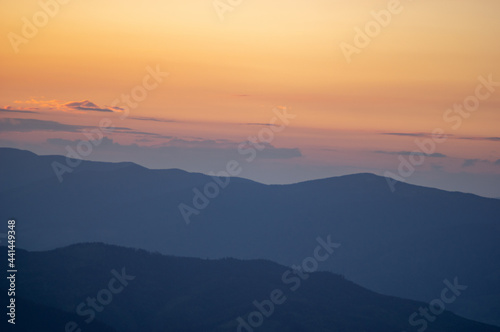 Beautiful orange sky during dusk in the carpathian mountains