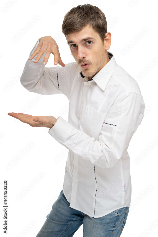 Young handsome tall slim white man with brown hair doing gestures with hands in white shirt isolated on white background Young handsome tall slim white man with brown hair doing gestures with hands in white shirt isolated on white background