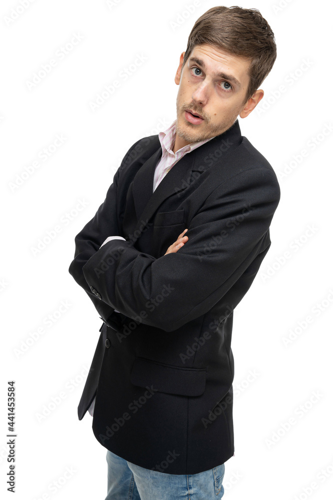 Young handsome tall slim white man with brown hair with folded arms in black blazer isolated on white background Young handsome tall slim white man with brown hair with folded arms in black blazer isolated on white background