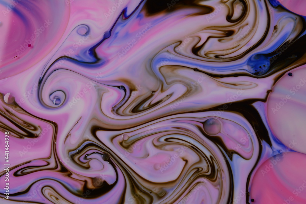 Fototapeta premium Abstract colors, backgrounds and textures. Food Coloring in milk. Food coloring in milk creating bright colorful abstract backgrounds. Colorful chemical experiment.