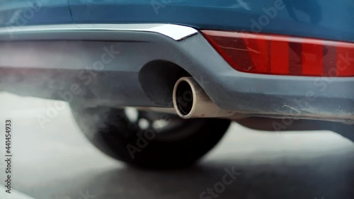 Transport Tailpipe Muffler Smog.Eco Problem On Toxic Gas.Air Pollution Smoke Car Exhaust Pipe Muffler.Ecology Problem With Co2 Dioxide Emission.Gasoline Or Diesel Car Exhaust Fumes Ecology Pollution.