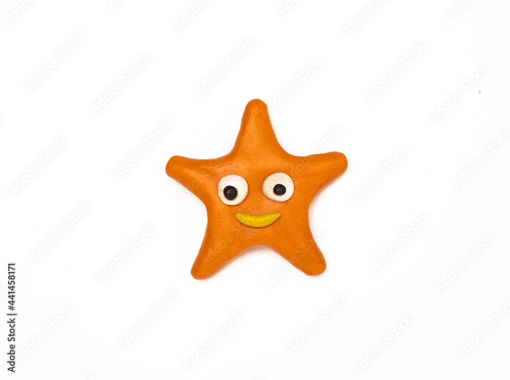 plasticine starfish on a white background plasticine starfish on a white background