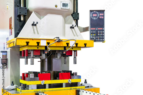Automatic hydraulic press stamping machine with press mold or die fixture for metal sheet forming in manufacturing process in industrial isolated with clipping path