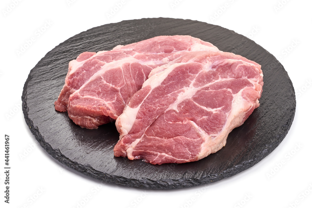 Raw pork steaks, isolated on white background. High resolution image.