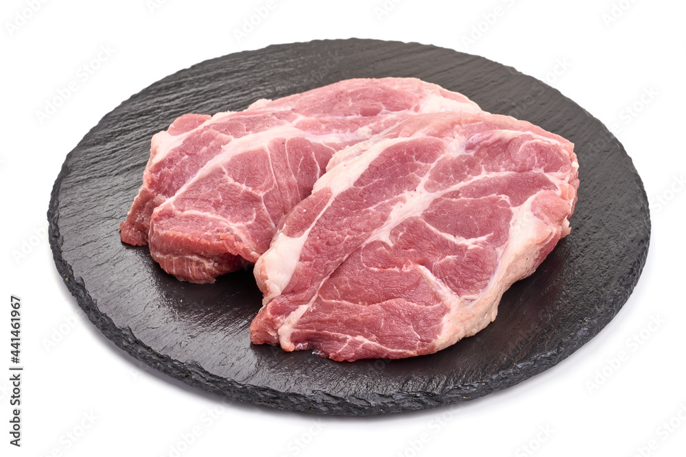 Raw pork steaks, isolated on white background. High resolution image. Raw pork steaks, isolated on white background. High resolution image.