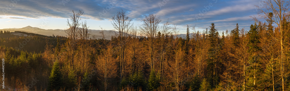 Picturesque sunrise above late autumn mountain countryside. Ukraine, Carpathian Mountains. Peaceful traveling, seasonal, nature and countryside beauty concept scene. Picturesque sunrise above late autumn mountain countryside. Ukraine, Carpathian Mountains. Peaceful traveling, seasonal, nature and countryside beauty concept scene.