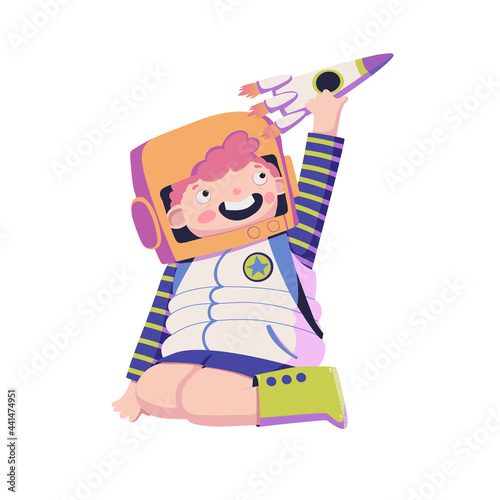Boy in a spacesuit playing with a rocket vector illustration