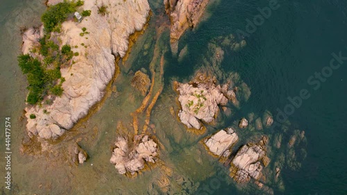 Many Big Rocks under The Sea or Ocean, Kamonokoshi in Mitoyo City in Kagawa Prefecture in Japan, Nobody, Aerial Top View from Flying Drone, Travel or Trip Image photo