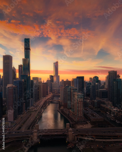 Aerial Cityscape of Downtown Chicago and Chicago River at Sunset Dusk
