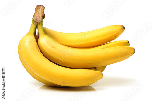 Fresh ripe bananas bunch isolated on white background 