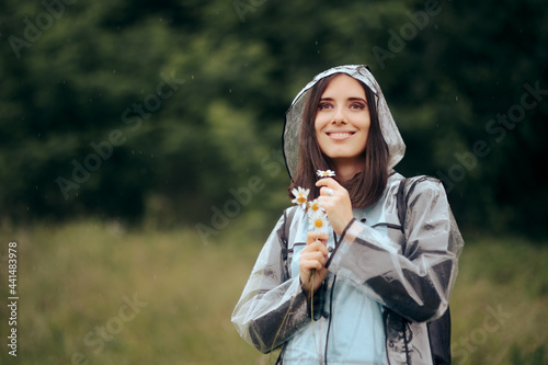 Smiling Woman Holding Dandelion Flowers Enjoying Rain Season