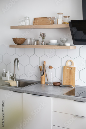 Empty modern kitchen interior white cosiness apartment cuisine design domestic furniture equipment