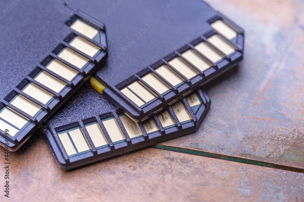 Contacts of several SD cards close up. Solid-state storage. Contacts of several SD cards close up. Solid-state storage.