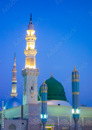 View of green dome of Nabawi Mosque in the morning during sunrise in Al Madinah, Saudi Arabia. photo