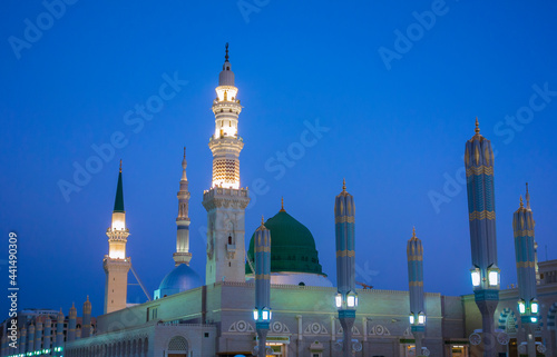 View of green dome of Nabawi Mosque in the morning during sunrise in Al Madinah, Saudi Arabia.