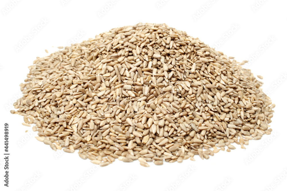 Peeled sunflower seeds pile on white background Peeled sunflower seeds pile on white background