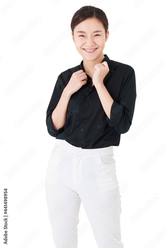 Asian adorable cheerful business working woman with hair tied wearing casual black shirt, happily and confidently smiling, posing and pulling collar, standing on isolated white background cutout. Asian adorable cheerful business working woman with hair tied wearing casual black shirt, happily and confidently smiling, posing and pulling collar, standing on isolated white background cutout.